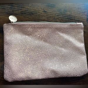 Ipsy pouch -This is a pink glittery color/material